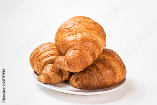  Breakfast three croissants on a white background