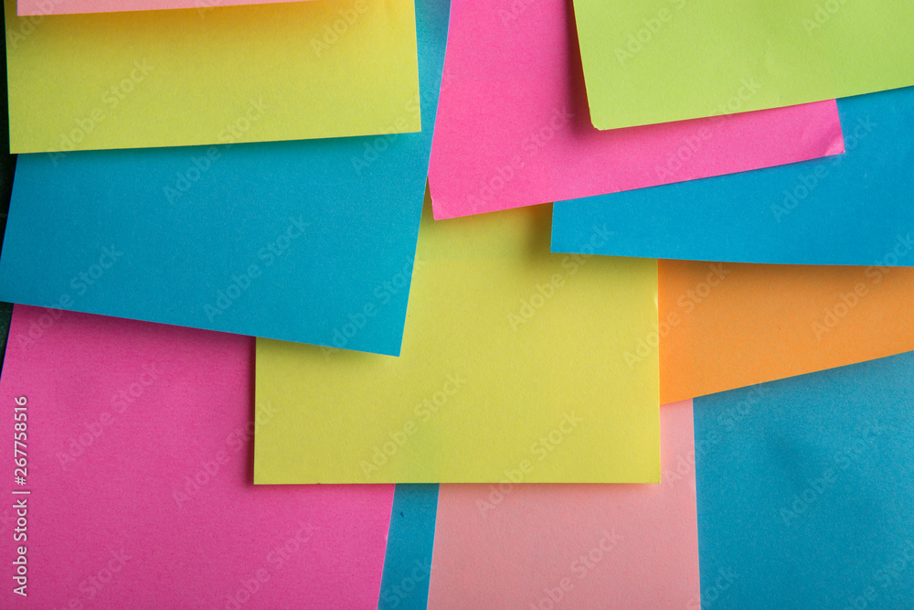 Fototapeta premium Colorful sticky notes on the blank blackboard