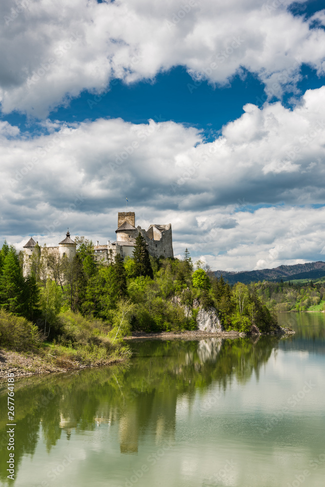 Niedzica castle on hill top at Czorsztyn lake and Dunajec river in Poland