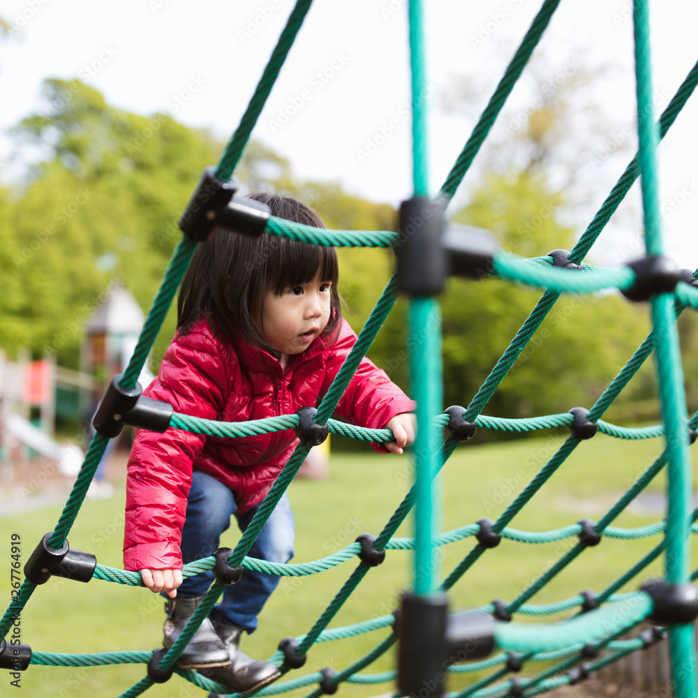 toddler girl play at outdoor playground toddler girl play at outdoor playground