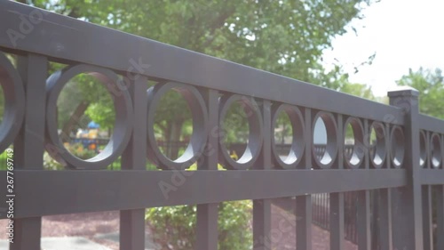 Close up rod iron gate summer