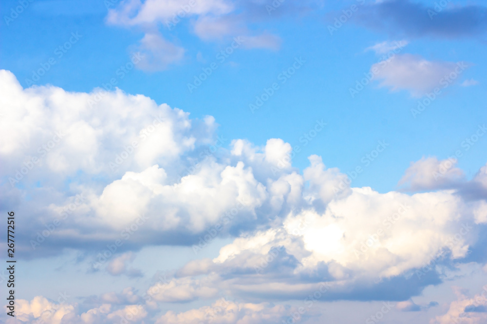 Beautiful gloomy blue sky with fluffy clouds in summer morning peace day as a background. Gray, white and turquoise color blured skyline photography. Beautiful gloomy blue sky with fluffy clouds in summer morning peace day as a background. Gray, white and turquoise color blured skyline photography.
