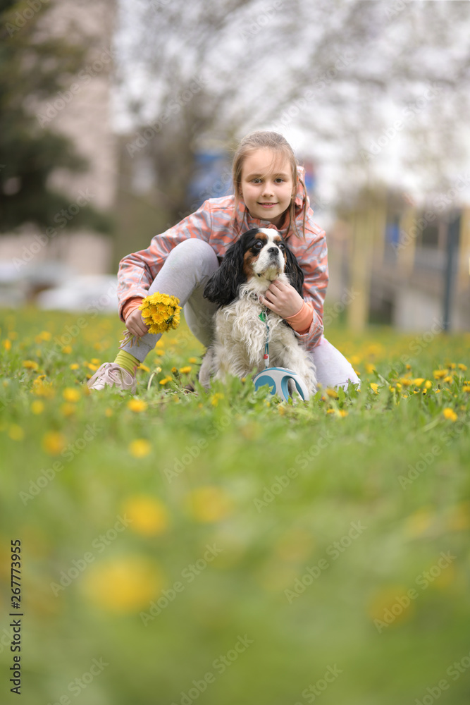 Happy girl with a dog 