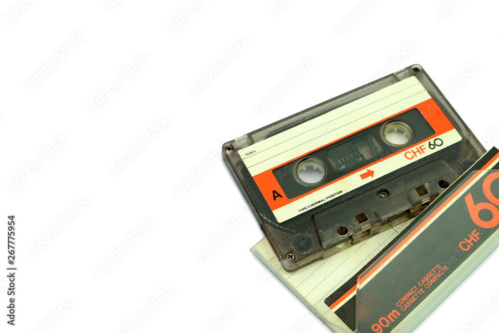 Old cassette tape audio isolated on white background, Gadgets accessories for the 70-80-90's era. Old cassette tape audio isolated on white background, Gadgets accessories for the 70-80-90's era.
