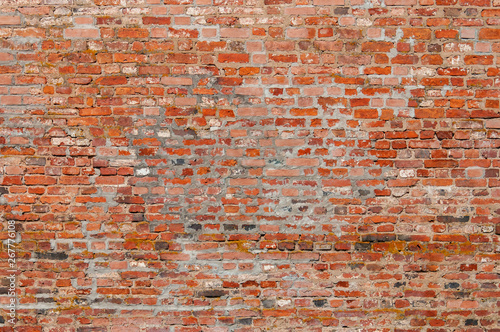 18th century wall. Background of old red bricks.