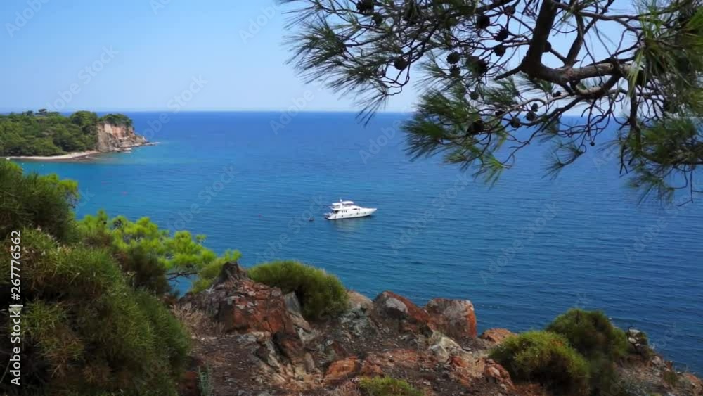 View from hill to Mediterranean Sea in Phaselis with yacht. City of ancient Lycia. Turkey. View from hill to Mediterranean Sea in Phaselis with yacht. City of ancient Lycia. Turkey.
