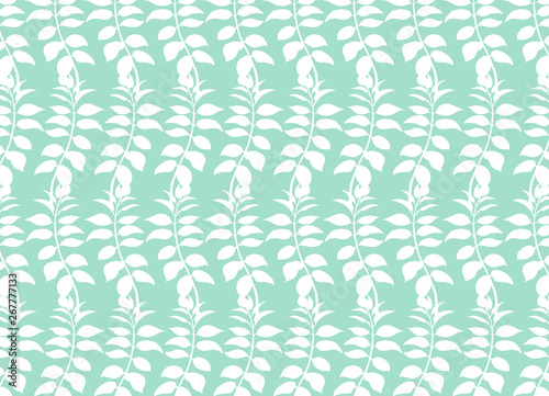 Abstract turquoise background with a pattern with branches of leaves