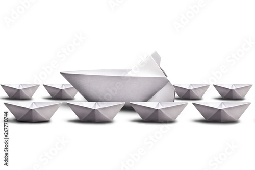 Handmade paper boats, image for corporate environment with concept leadership team nade.