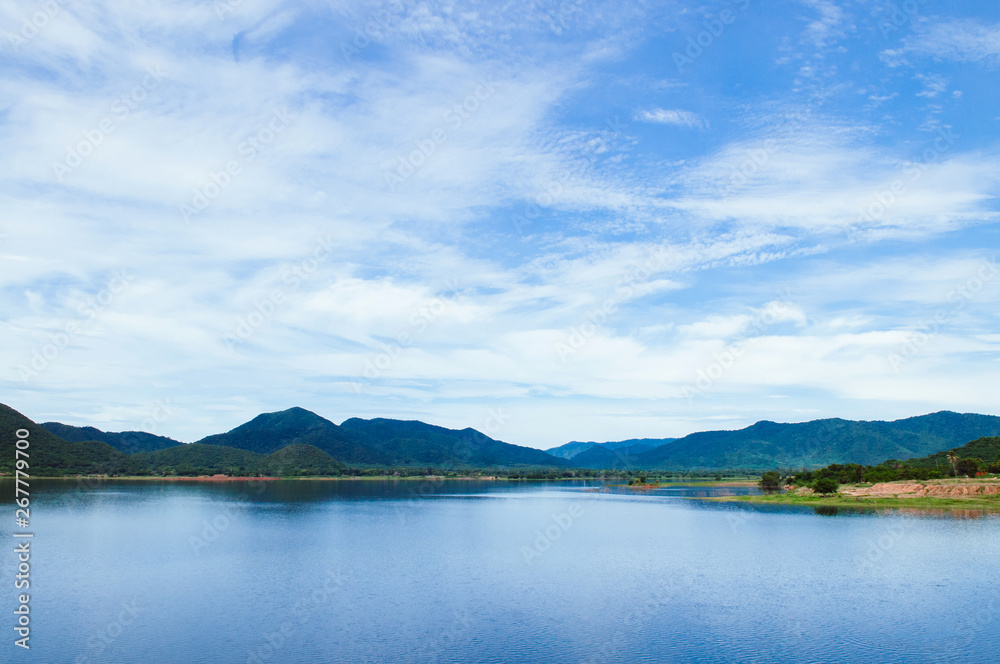 Blue lake of Yang Chum Water reservior with summer sky - Thailand