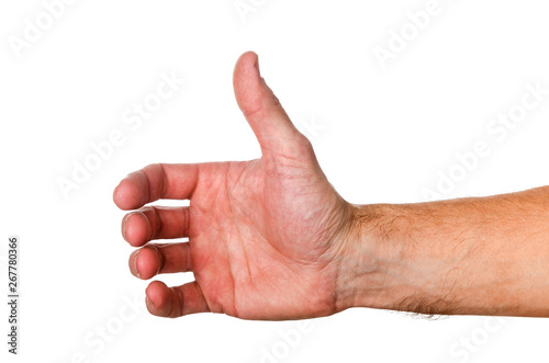 Male hand is holding something.