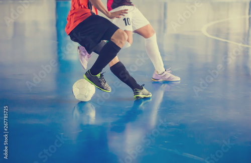 Indoor soccer sports hall. Football futsal player, ball, futsal floor photo
