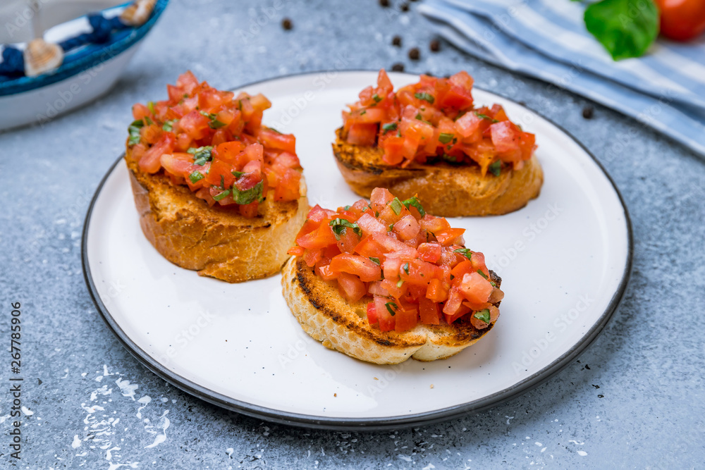 bruschetta with tomatoes on plate