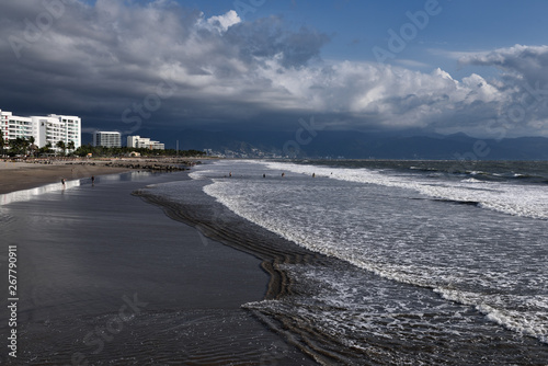 Tourists at wide beach of Nuevo Vallarta at Vidanta time shares near Puerto Vallarta photo