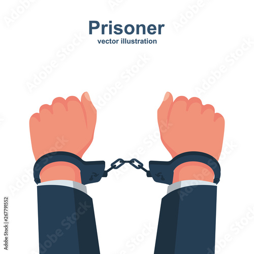 Hands in handcuffs. Human in jail