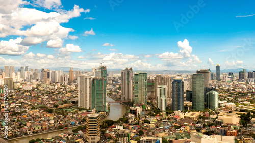 Skyline of Manila by the River Pasig