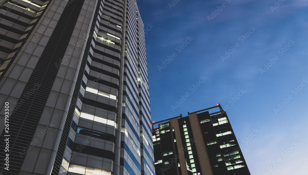 City windows at night.  Hotels and apartments for rent.