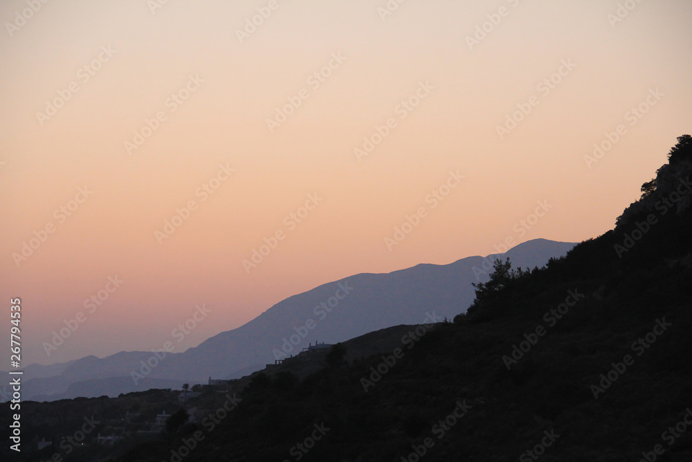 Colorful mountain landscape at sunrise, sunset colors silhouette of the hills establishing shot, calm nature, epic tourism