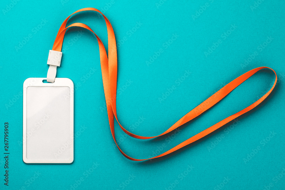 Empty ID card / icon with an orange belt, on a blue background. Space for text. Empty ID card / icon with an orange belt, on a blue background. Space for text.