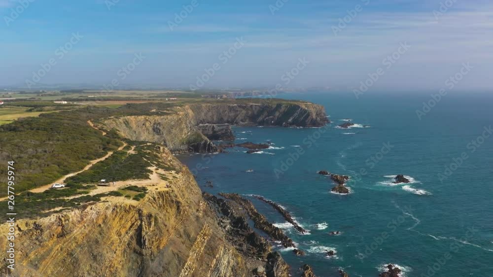 Aerial View Flying along cliff Over Blue Atlantic Ocean at Cabo Sardao, Portugal Aerial View Flying along cliff Over Blue Atlantic Ocean at Cabo Sardao, Portugal