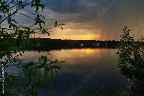 Clear lake at sunset. Beautiful summer landscape. © MineevPh