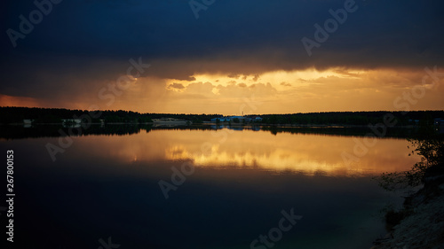 Clear lake at sunset. Beautiful summer landscape. © MineevPh