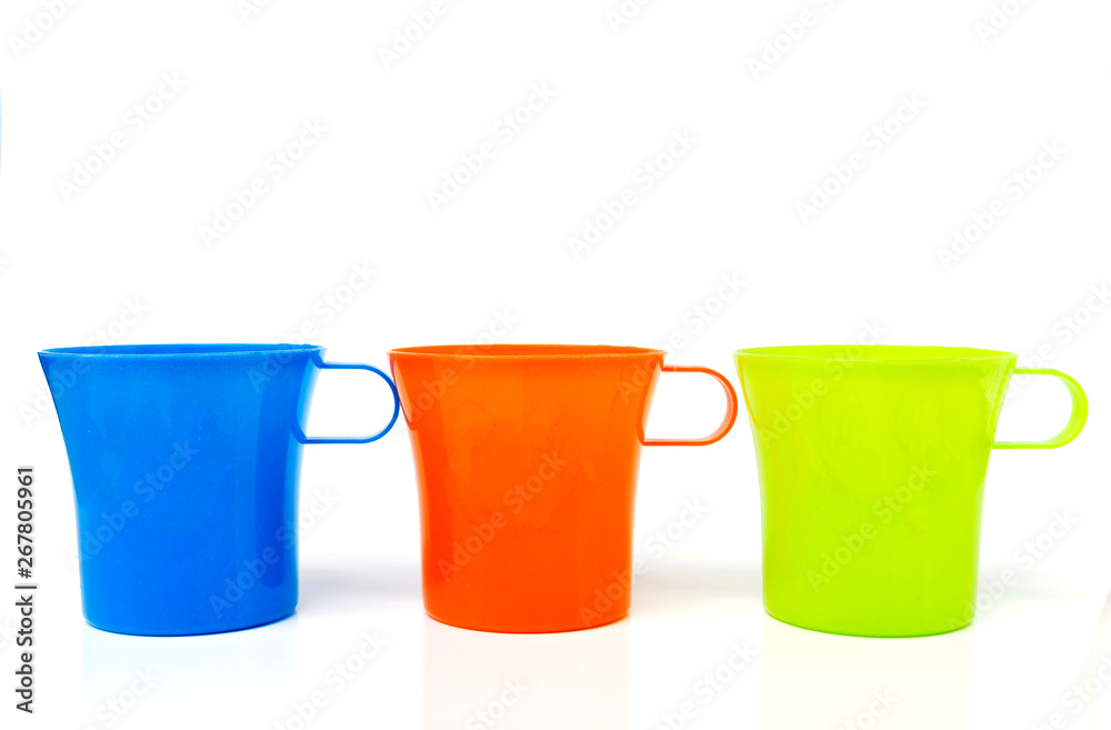 Colorful empty plastic cup isolate on white background Colorful empty plastic cup isolate on white background