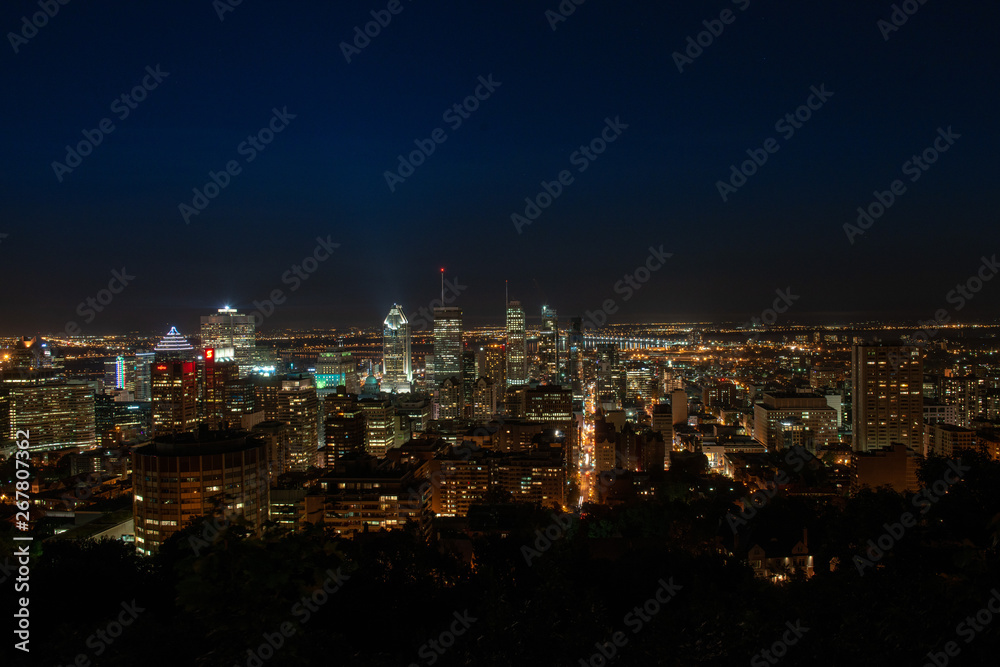 Montral urban landscape by night with tall building and city lights