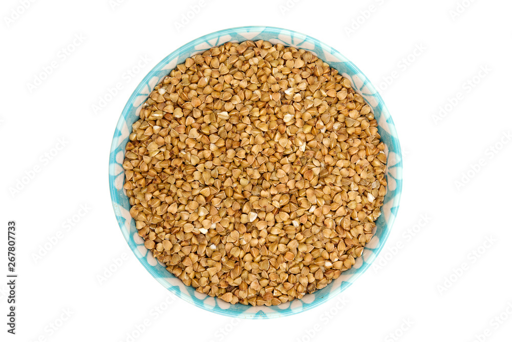 Dried brown buckwheat (Fagopvrum esculentum) isolated on a white background.Top view. Dried brown buckwheat (Fagopvrum esculentum) isolated on a white background.Top view.