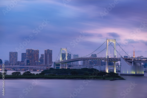Rainbow bridge  Tokyo skyline and Tokyo tower  evening scene