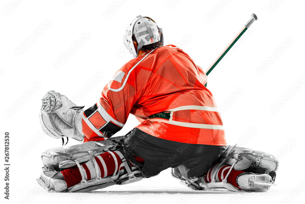 Professional ice hockey player goalkeeper in action on white backgound Professional ice hockey player goalkeeper in action on white backgound