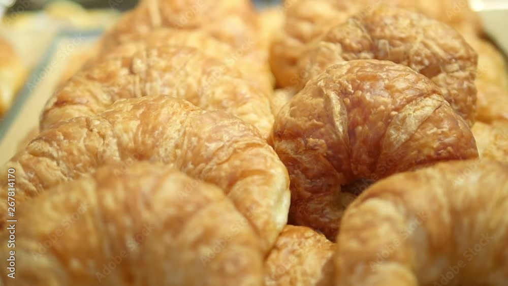 Bakery - Croissant on a rotating tray for an appetizing breakfast. Bakery - Croissant on a rotating tray for an appetizing breakfast.