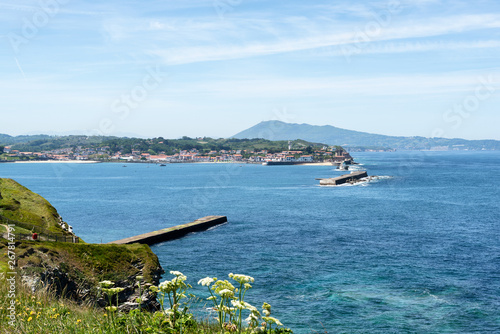 Sea walls at the entrance of the bay of Saint Jean de Luz. Basque Country of France. photo
