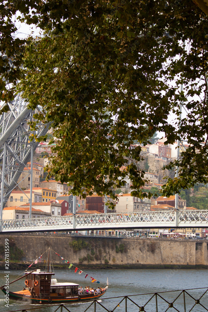 Plakat Boat across Douro River with Dom Luis I Bridge background at Porto, Portugal