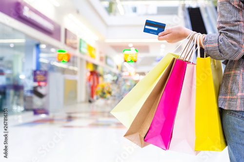 Woman Carrying Shopping Bags And Credit Card