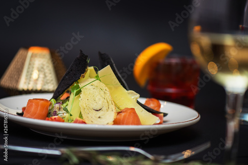 Caesar salad with salmon fi...