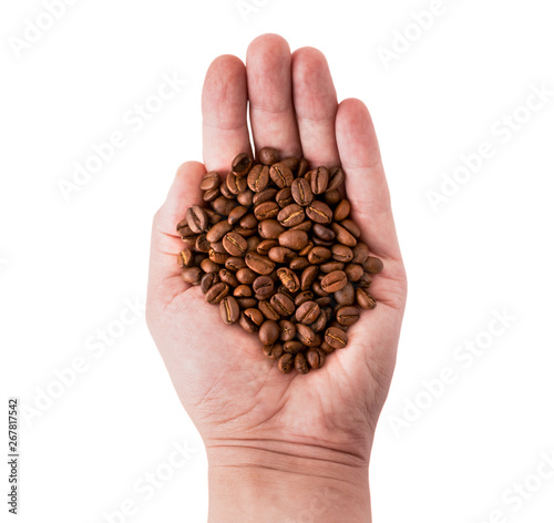 Coffee beans in the hand of a man on a white. The form of the top.