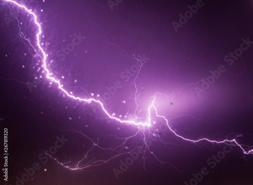 powerful lightning strikes over night sky 