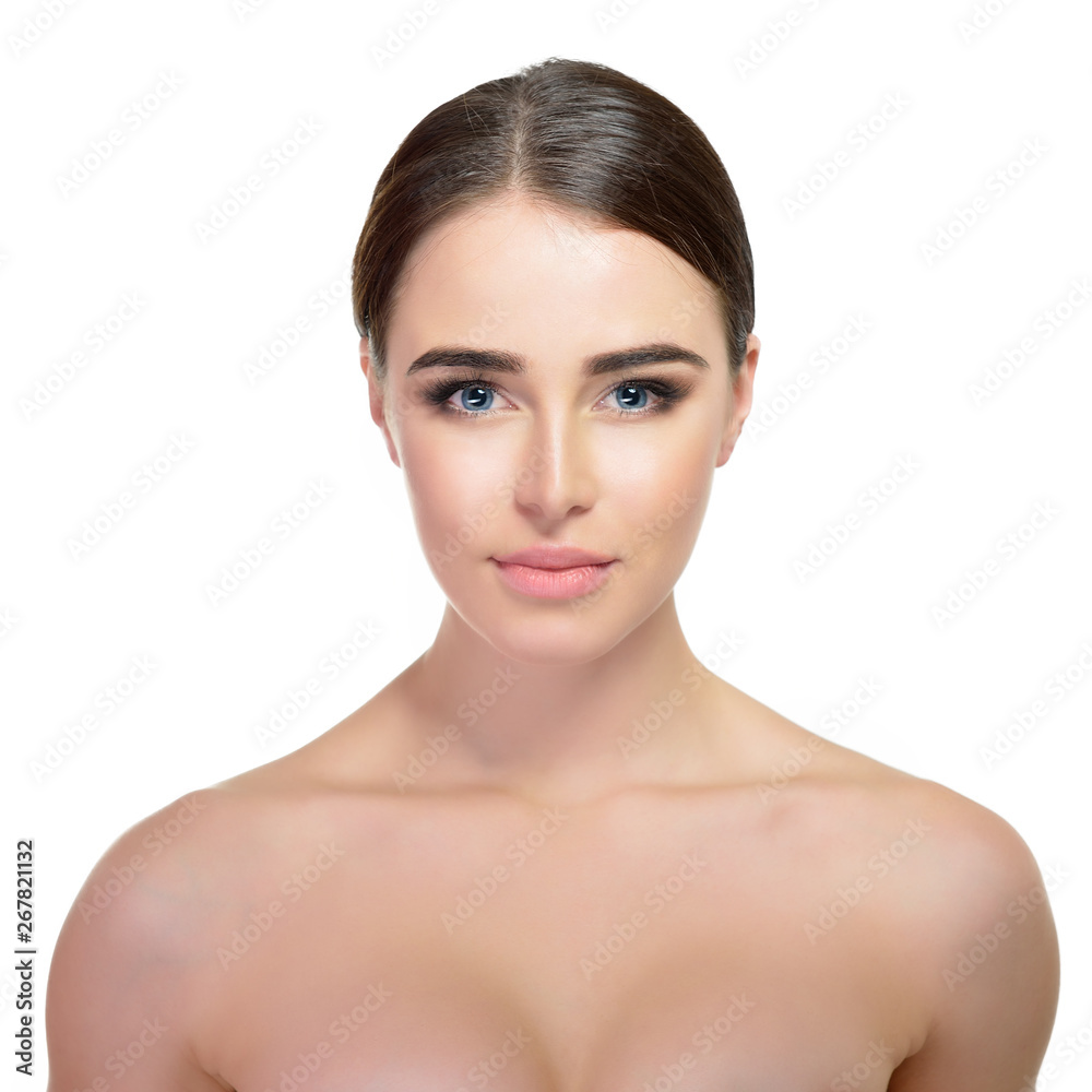 Beauty female portrait. Young attractive woman posing at studio over white background. Beautiful girl. Model with perfect make-up Beauty female portrait. Young attractive woman posing at studio over white background. Beautiful girl. Model with perfect make-up