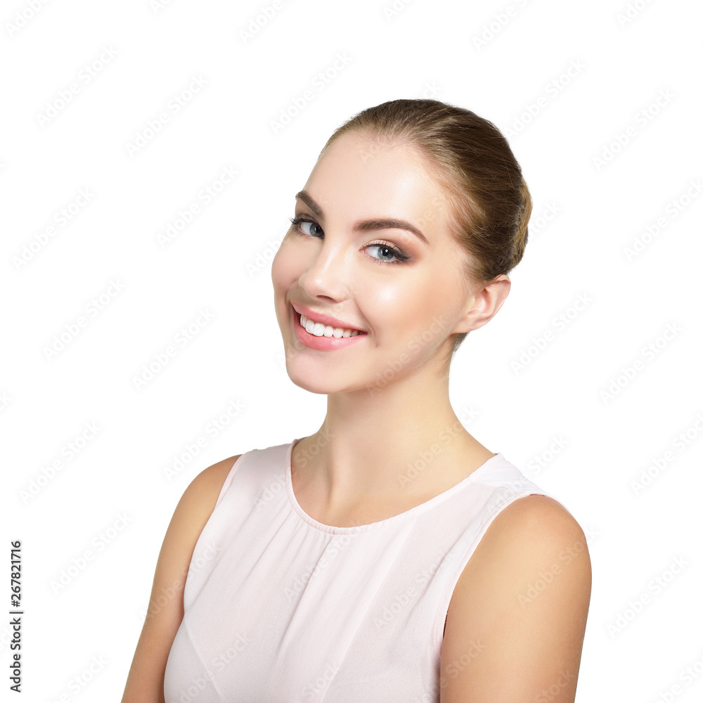 Fototapeta premium Beauty female portrait. Young attractive woman posing at studio over white background. Beautiful girl. Model with perfect make-up