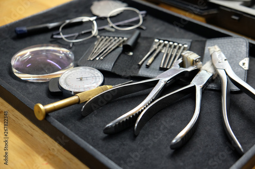Optician repairing Equipment and fixing eyeglasses, Toolbox Repair Tool. Tooling Parts.