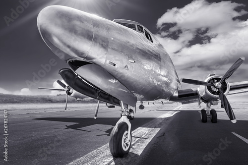 historical airplane on a runway ready for take off