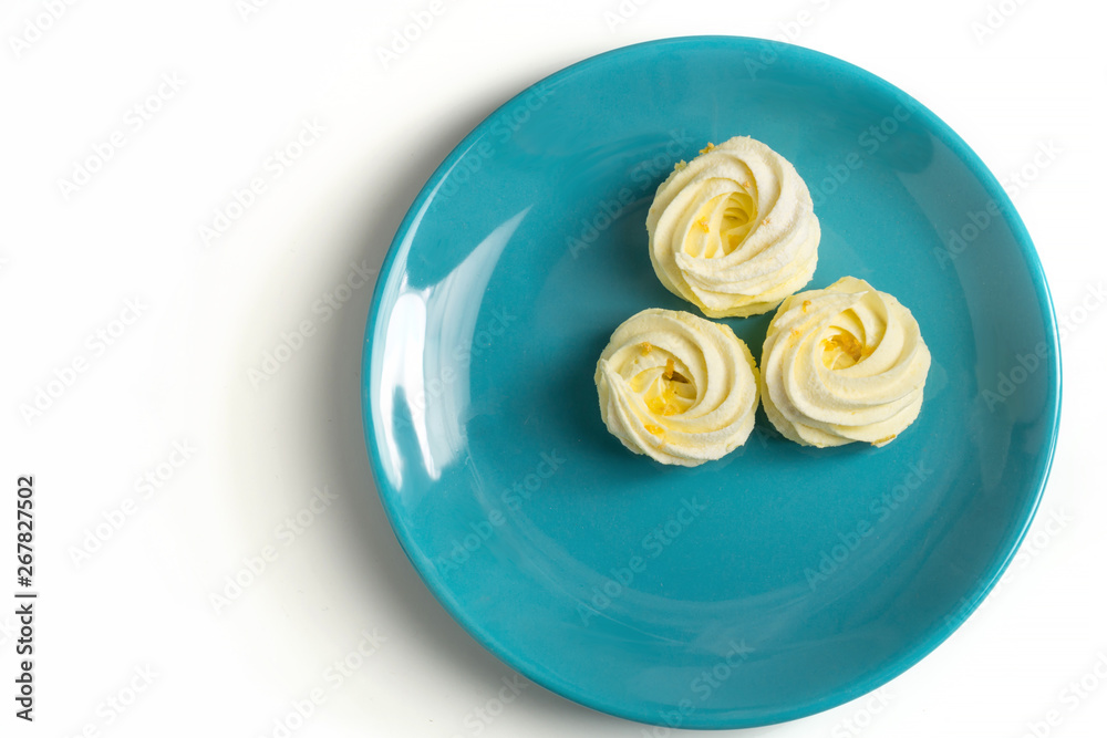 Homemade zephyr or marshmallow in blue plate