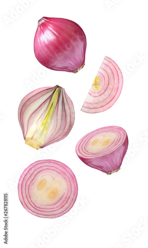 Onion red the set of the falling, soaring, hanging heads and broken pieces slices isolated on white background with clipping path.