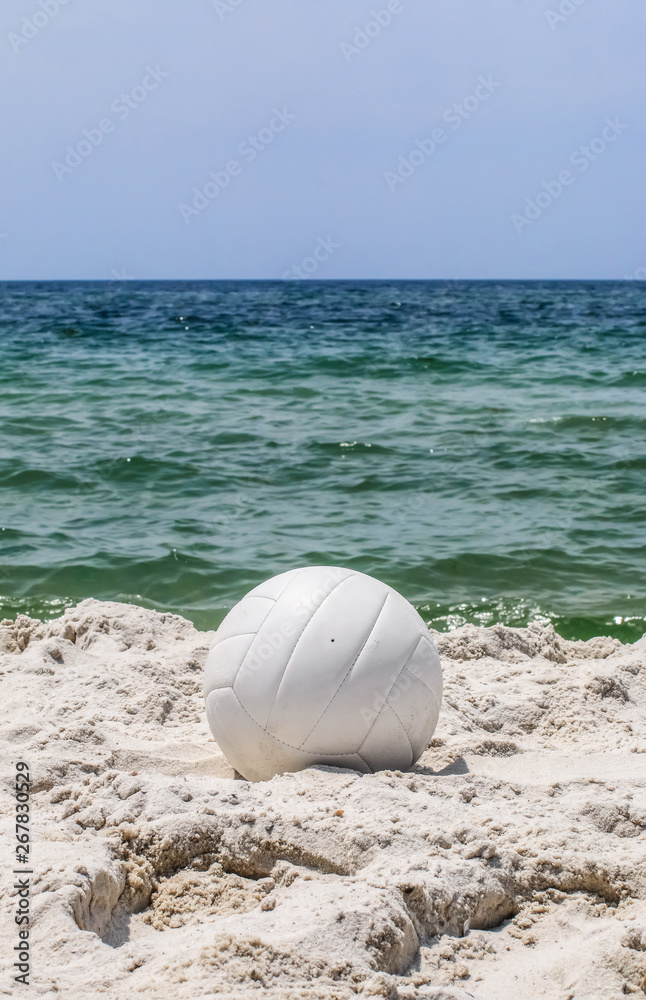 White Volleyball on the Beach - Vertical View White Volleyball on the Beach - Vertical View