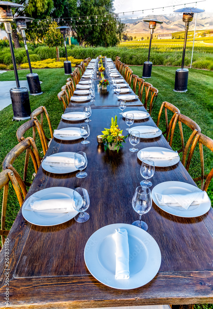 Fototapeta premium Table settings on a Lawn