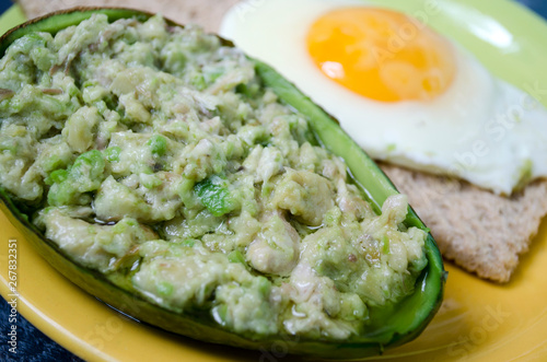 dish with avocado and egg for breakfast
