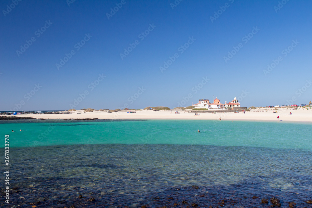 Clear water paradise beach in fuerteventura, canary islands, spain