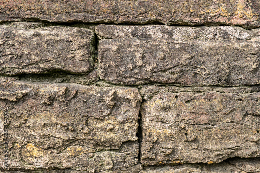 texture of the walls made of limestone. brickwork close-up texture of the walls made of limestone. brickwork close-up