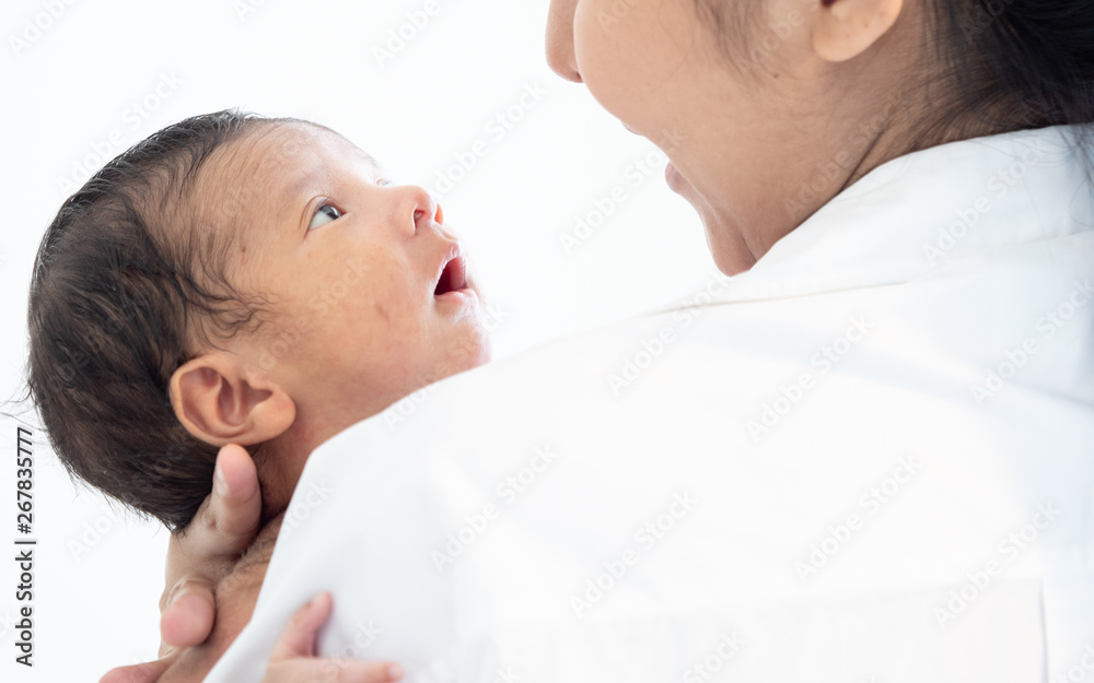Portrait of Asian young mother newborn son in living room Portrait of Asian young mother newborn son in living room