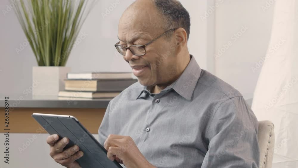 Senior man using a tablet/ipad Senior man using a tablet/ipad